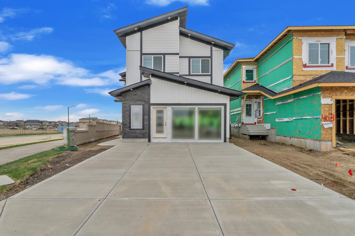 Custom walkout home exterior in Woodbend